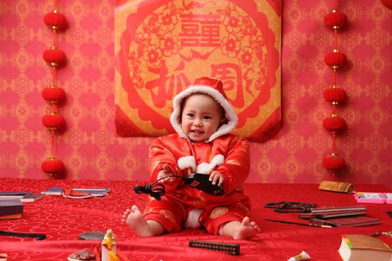 一岁宝宝抓周怎么摆准备哪些东西 小孩抓周忌讳什么